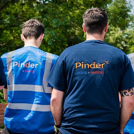 Pinder Cooling and Heating engineers in branded clothing